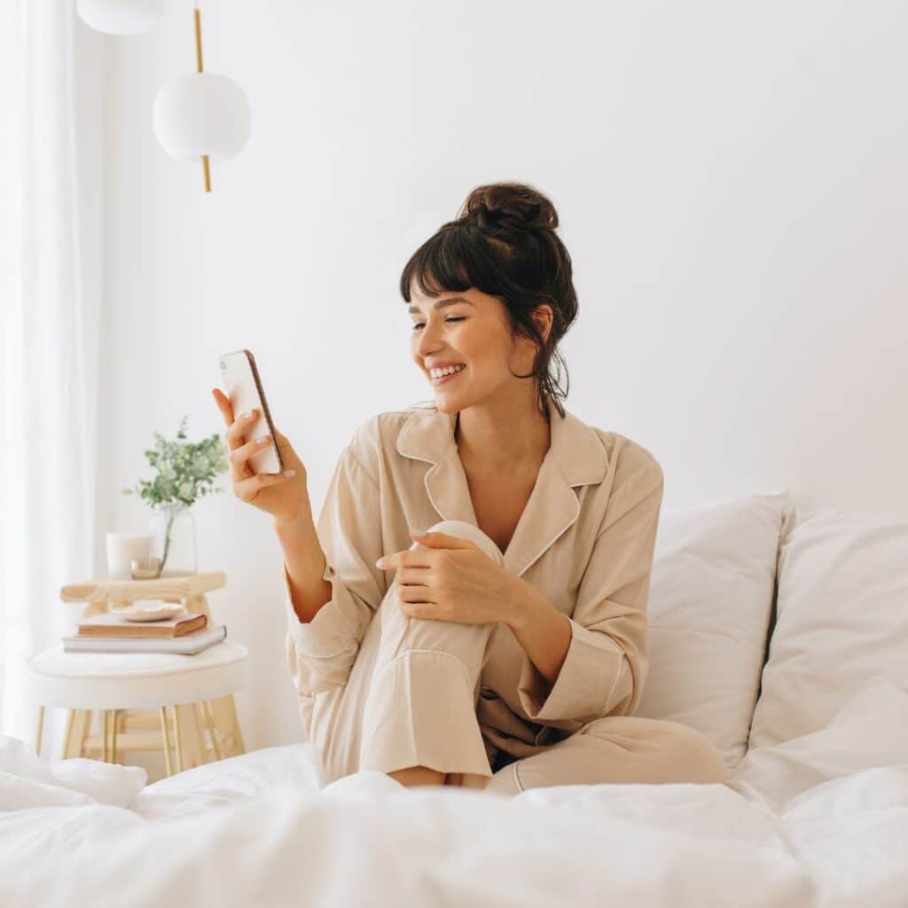 Adult woman sitting in bed