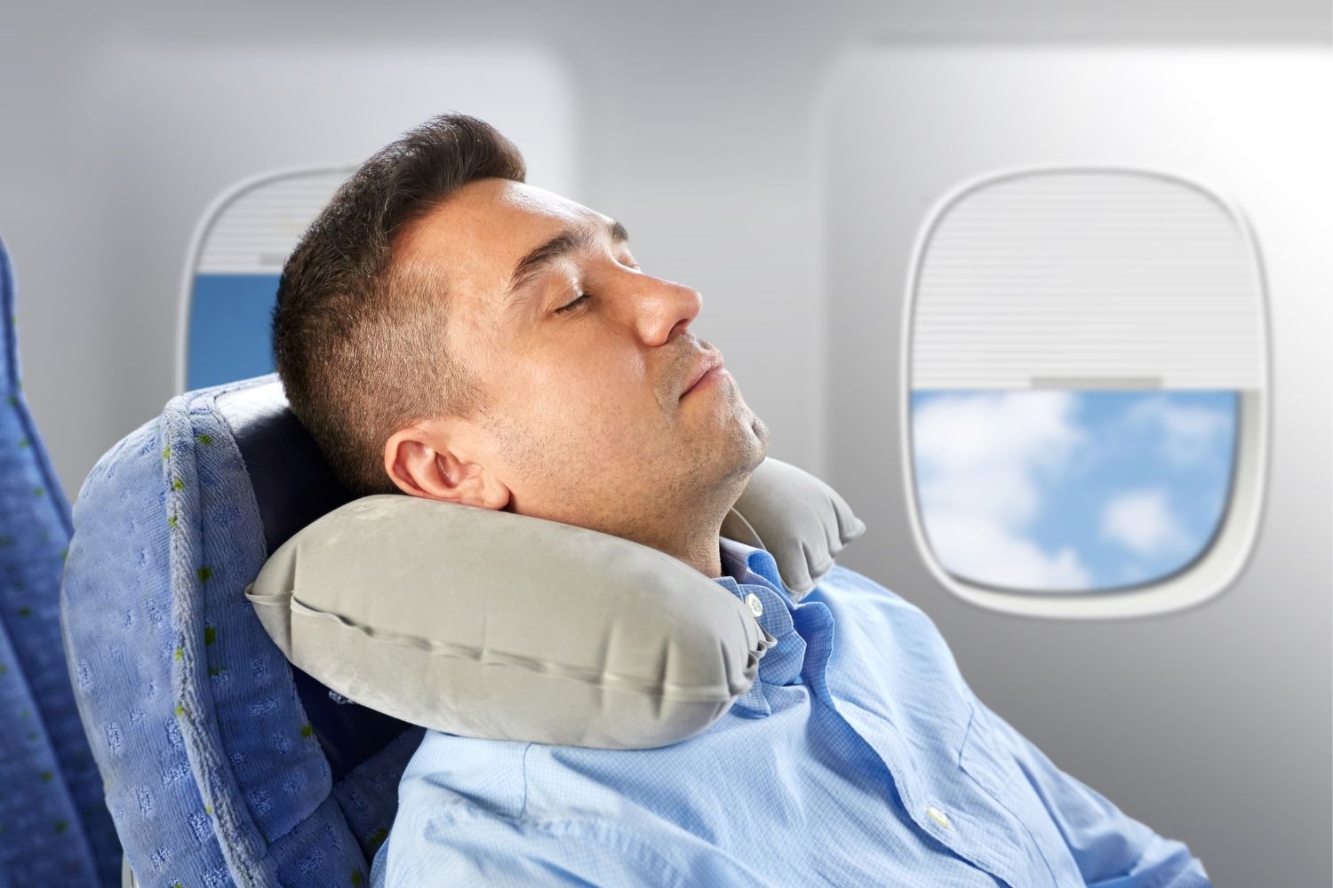 Man sleeping in a plane while travelling